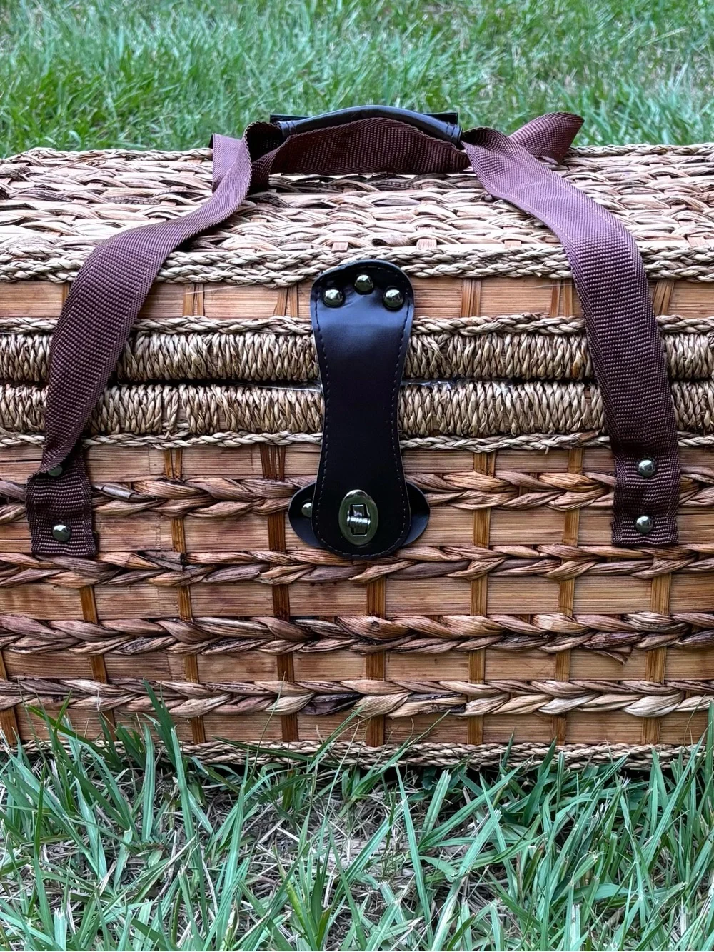 Woven Picnic Basket with Brown Straps and Leather Accents